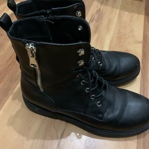 Black combat boots fit size 9.5 womens.